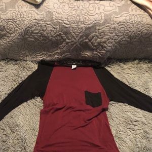 Maroon and black tee.